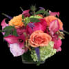 Clematis, calla lilies, peony, mini green hydrangea, orange roses