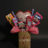 A bright and cheerful Valentine&rsquo;s candy bouquet filled with a playful mix