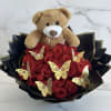The bouquet is carefully crafted with vibrant, velvety red roses, symbolizing love
