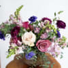 Snapdragons, anemones, and more abound in this full and bewitching display --