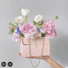 Adorable and so chic! This pink purse gift bag comes with a