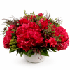 Velvety red hydrangeas and romantic blooms unfold in rich layers, accented with