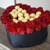 Win her heart with roses and chocolates in a heart shaped box.