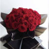 Two Dozen premium red roses ,elegantly arranged  and  wrapped with