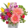 " square vase
foliage: var. mini pittosporum
2 pink gerberas
2 yellow tulips
2 stems pink