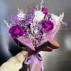 6 assorted purple and white preserved roses with purple preserved baby's breath