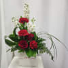 Celebrate Love with this elegant floral arrangement with red roses, red carnations