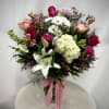 A classy, romantic arrangement designed to let every bloom tell a story.