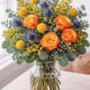 The Firecracker is a bold burst of floral energy&mdash;bright yellows, fiery oranges