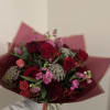 A Large Lush Wrapped Bouquet of Seasonal Favorites in a red and