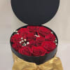 Very Elegant Black round box with a lid field with 12-14 red
