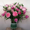 Light Pink Roses in tall glass vase 