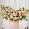 Pink roses symbolize admiration and joy, while white roses represent purity and