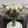  White Roses With Greeneries.
22" H x 20'W 