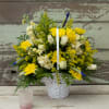 Welcome the newest addition with this bright and cheery basket of blooms.
