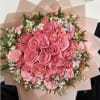  A bouquet of pink roses bordered with carnations, alstroemeria, and chamomile