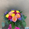 Stunning, vibrant roses designed low and lush to let your special person