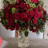 This is a beautiful floral arrangement in a clear vase with an
