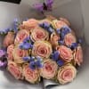 24 roses in the color of your choice paired with filler flowers
