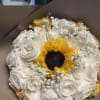 This bouquet is created with 30 roses and 1 sunflower in the
