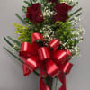 Beautiful arraignment with 3 red roses and ribbon 