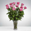 Twelve vibrant lavender roses, arranged in our sleek, minimalist vase to designed