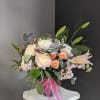 A beautifully selected bunch of the freshest flowers in a vase uniquely