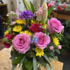 A colorful fresh mix bouquet , custom designed every time. Florals and