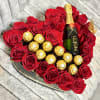 Mini Mo&euml;t combined with red roses and chocolates ferreros , perfect to