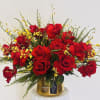  a delightful combination of 24 Stems of Red Freedom Colombian roses