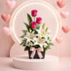 Designer&rsquo;s Romantic Choice is a hand-crafted floral arrangement featuring roses, lilies, and