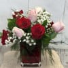  Red, Pink, &amp; White Roses nestled in Baby"s Breath &amp; designed