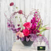 Vibrant Valentine favorites presented in a modern heart shape including roses, tulips