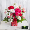 Simply sweet!  A festive Valentine container adorned with hearts is filled