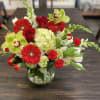 XL glass Jar filled with beautiful red roses, hyacinth, hydrangeas, gerbera, orchids