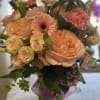 A BEAUTIFUL BOUQUET OF BLUSH PINKS AND PEACH HUES IN A BOW