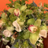 A luxurious floral arrangement crafted with premium blooms and refined design, expressing