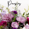 Surprise them with a stunning hand-designed arrangement full of fresh, purple blooms!