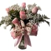Beautiful pink roses with touches of baby breath to give it that