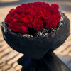 his stunning bouquet of 24 premium Ecuadorian red roses is a true