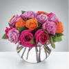 One dozen vibrant mixed color roses.

*Vase/container may vary depending on availability of