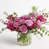 One dozen lavender roses surrounded by stock , eucalyptus and lily grass.

*Vase/container