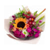 Beautiful bouquet of mixed flowers including a sunflower, perfect for bringing joy
