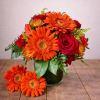 Uniquely hand-created by our experienced designers this beautiful arrangement of happy peach