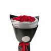A striking hand-wrapped bouquet of premium red rose stems, finished in sleek