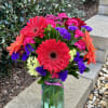 A beautiful and bold colored arrangement for those gerbera daisy loving people!