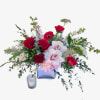Turn up the heat with this sultry arrangement of deep red roses