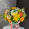 A beautifully selected bunch of the freshest flowers in a vase uniquely