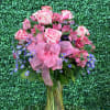 This beautiful combination of two-tone roses, pink astromelias and delicate lilac flowers