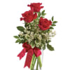 Deluxe rose bud vase featuring three beautiful roses, assorted greenery, and tiny